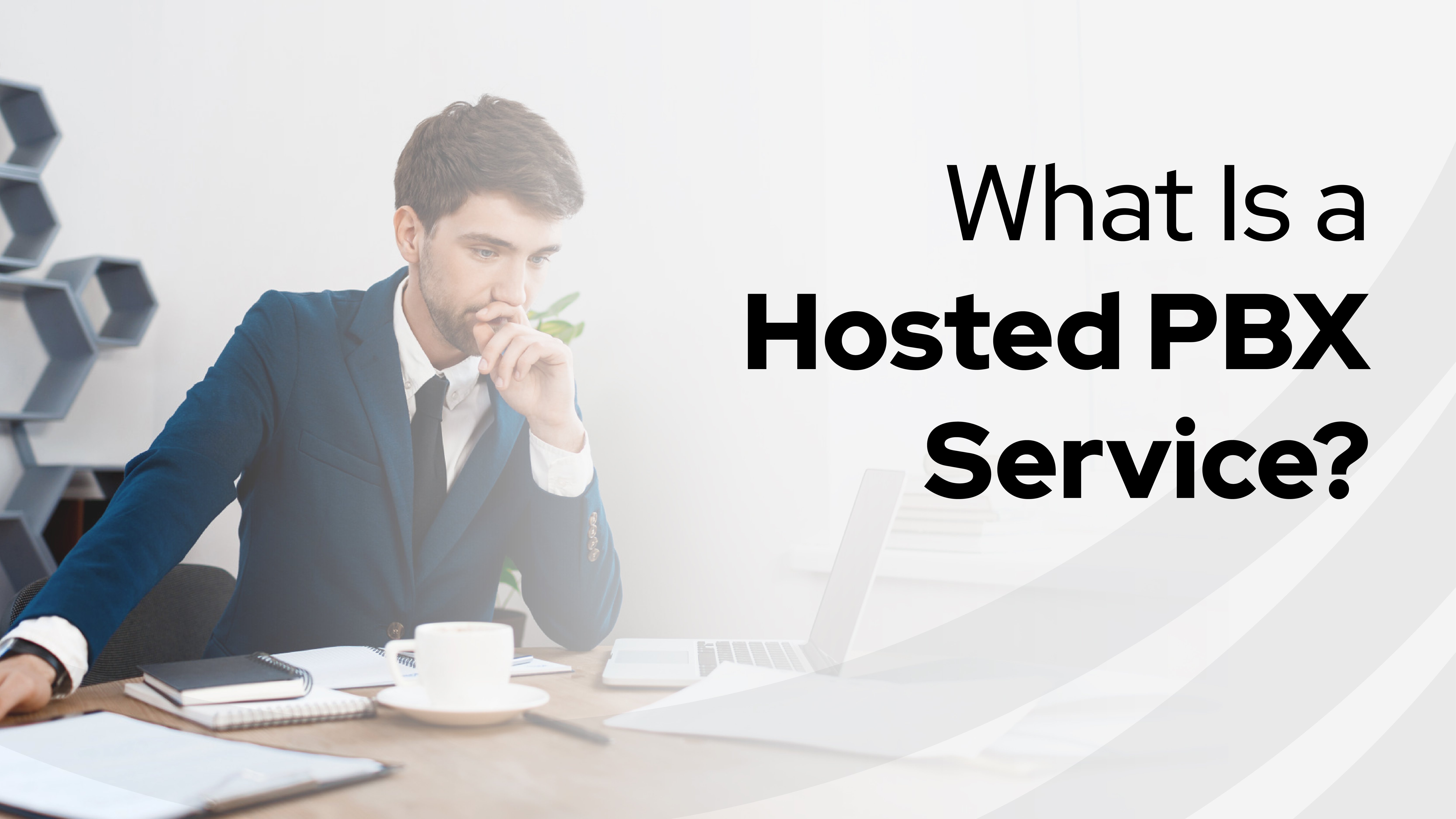 Business professional working at a desk with laptop and notebook beside text explaining what a hosted pbx service is and how it supports communication.